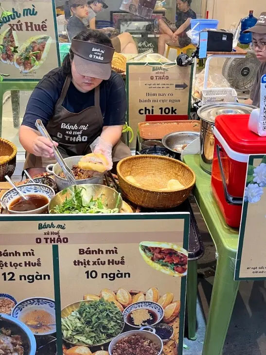 Banh Mi street food - banh. mi prices are vary from 25k VND to 35k and , almost USD 1 to 1.2