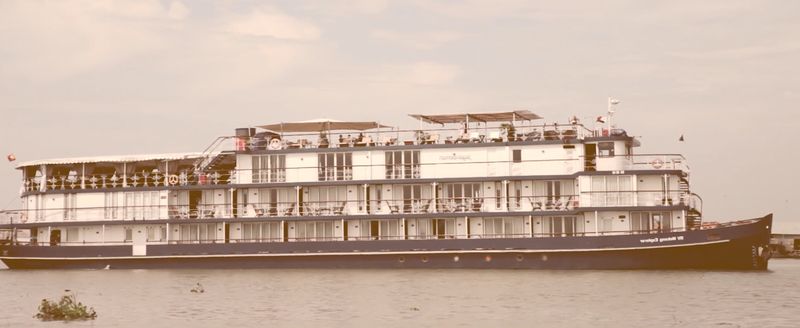 mekong river cruise holiday - a cruise vessel winding through the mekong waterways from vietnam to cambodia