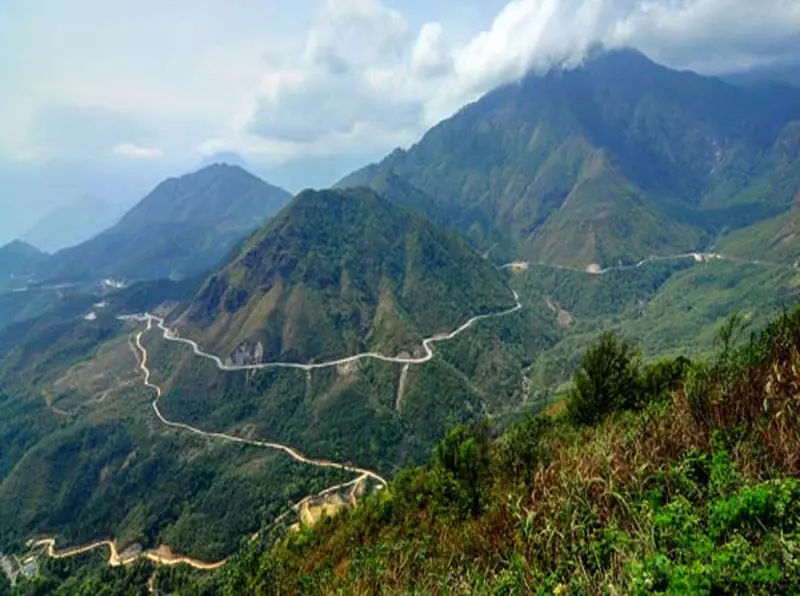 mountain passes covered in heady mist and fog in rainy season