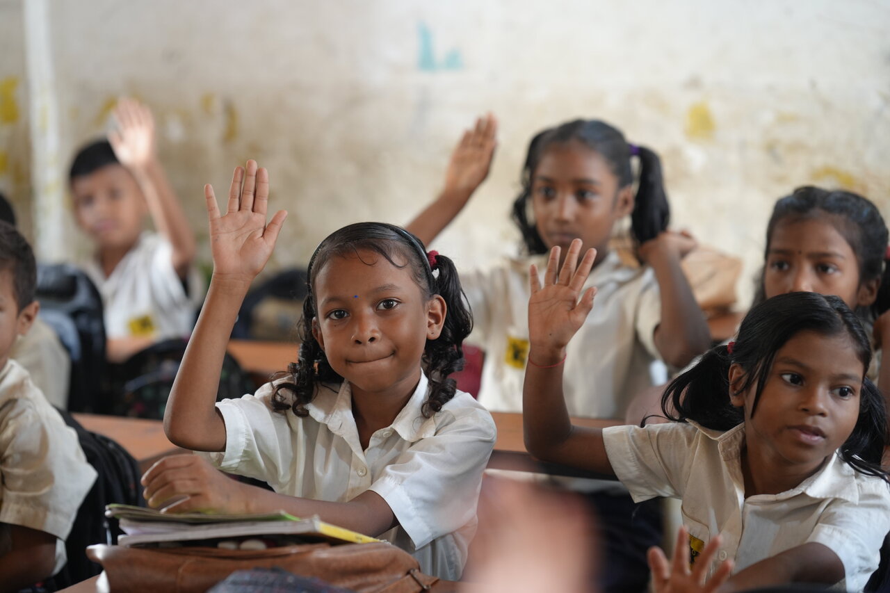 A child learning in a JAAGO Foundation classroom with hope and focus