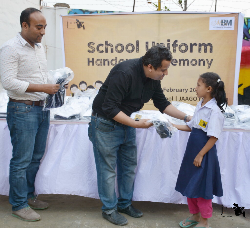 MBM Group representatives and JAAGO Foundation team celebrating their long-term partnership
