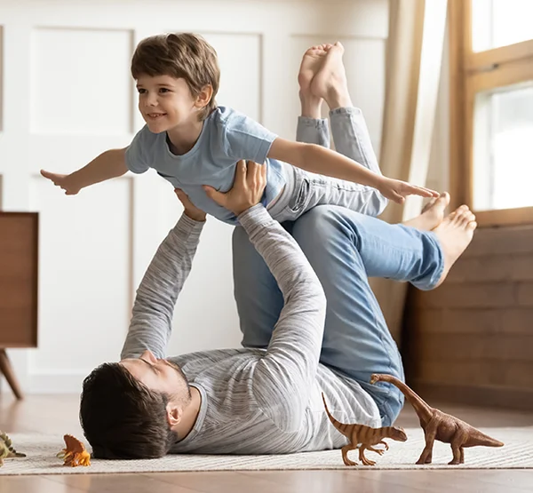 Dad playing with son