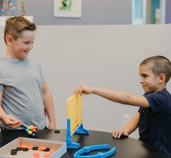 kids playing connect four