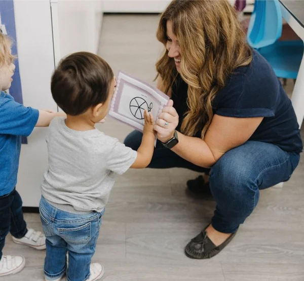 Child showing drawing