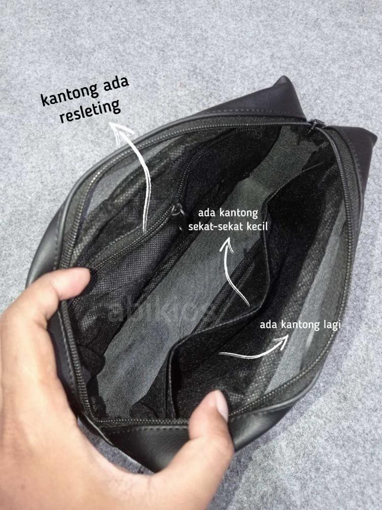 Produk Tas Tangan Bahan Kulit Simple Hitam Pria atau Wanita Casual