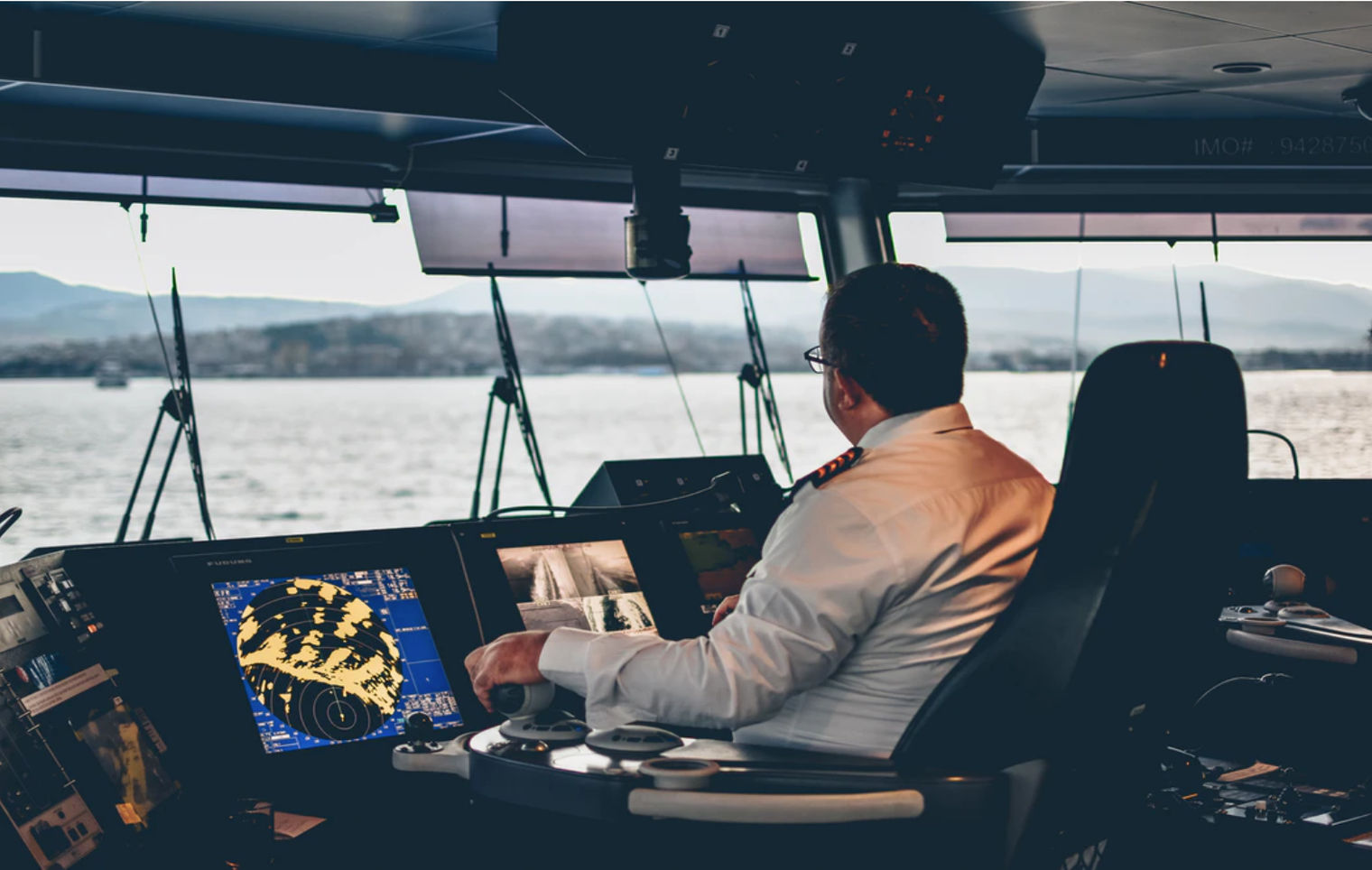 A person using an interactive map to drive a cargo