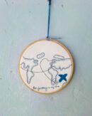 Hand embroidered traveler hoop wall hanging. Perfect for home decor
