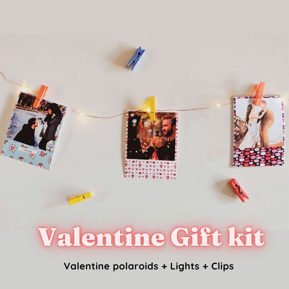 love themed polaroids with fairy lights and clips