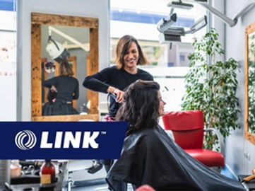 Barber and Beauty Salon on Busy Shopping Strip