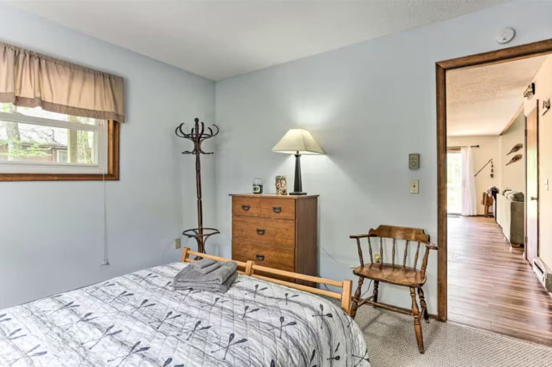 First-floor bedroom featuring a comfortable full-size bed, perfect for a restful stay