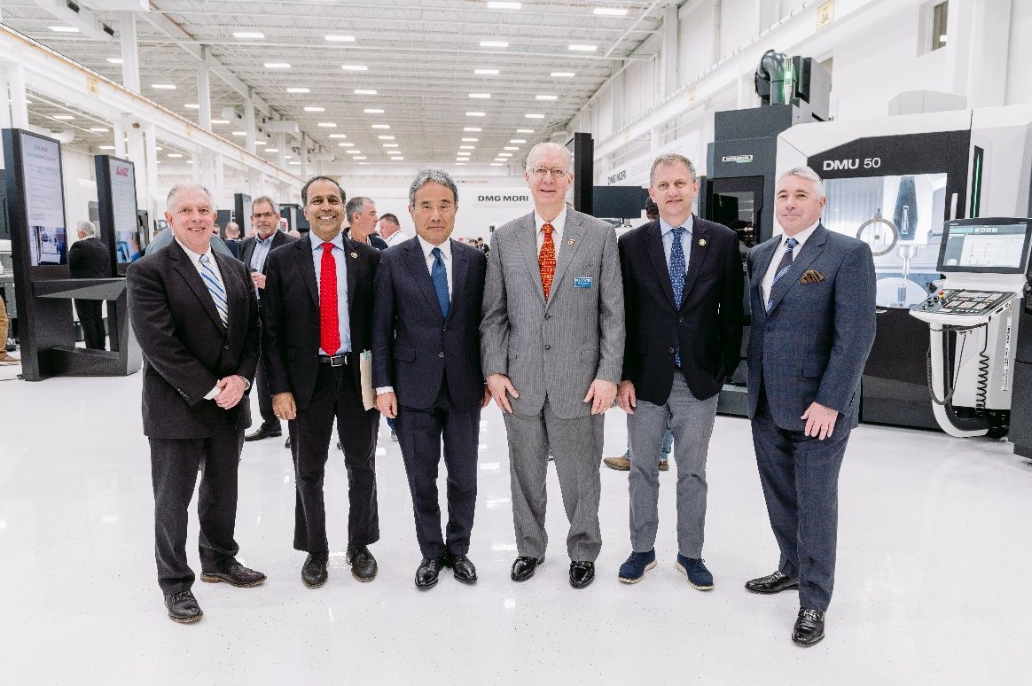 A group of men in suits

Description automatically generated with medium confidence