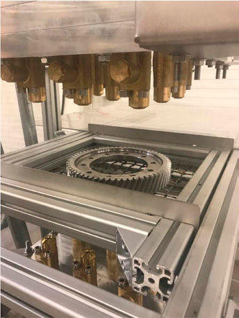 Figure 2—Test rig for WSpQ, providing a nozzle system positioned above and below the parts to be quenched.