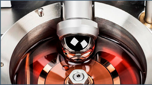 Figure 19—Commercially available ball on disc test cell (Ref. 18).