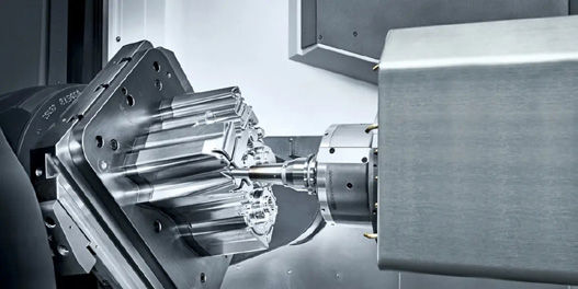 Applications for the DMU 65 H monoBLOCK2 include workpieces on high clamping towers, complex 5-axis geometries, and reliable deep hole drilling. (Image: DMG Mori)