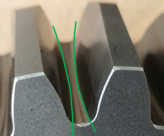 Figure 11—Hourglass root width provides a dam effect.