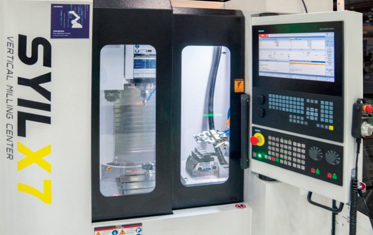 Figure 1—Displayed here are the Syil machine tool and Kuka robot interacting, with all motions run on the Sinumerik RunMyRobot/Handling application directly in the control. (All images: Siemens)