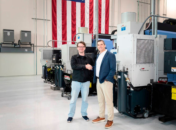 Tom Carrubba (right), vice president of production operations at Lockheed Martin, and Chris Power (left), chief executive officer of Hadrian, agree to a Memorandum of Understanding at Hadrian’s headquarters in Los Angeles.