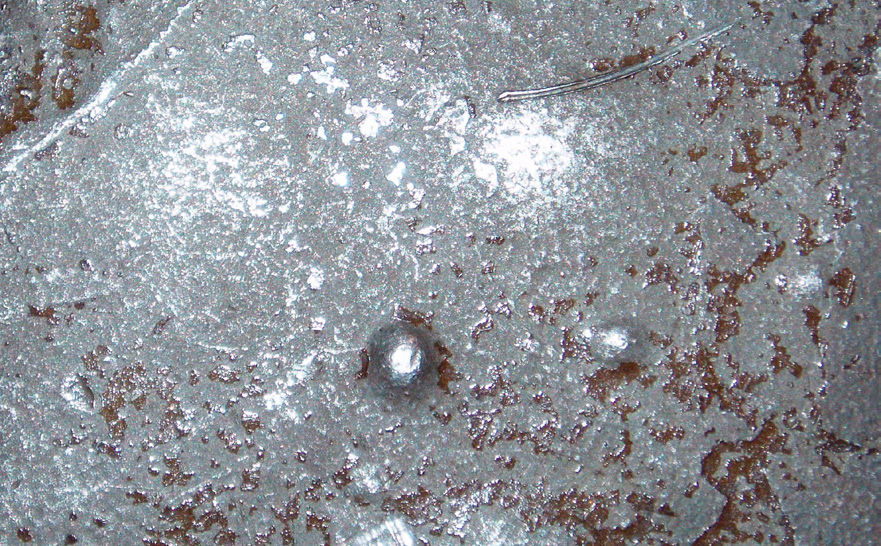 Figure 3—Surface blisters on SAE 1020 steel caused by trapped hydrogen—common in ductile metals and typically harmless under low stress, though larger blisters can reduce material ductility.