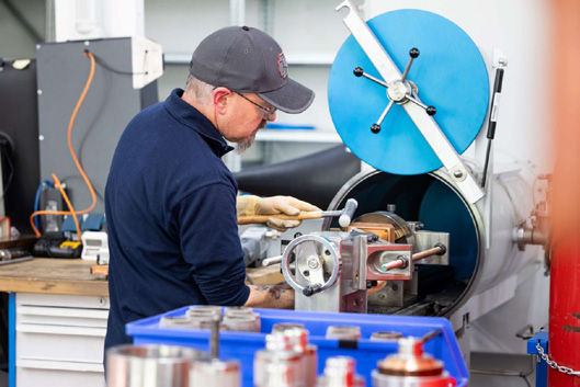 Precision manufacturing of filtration sieves for the Orion spacecraft. (Image: John Crane)