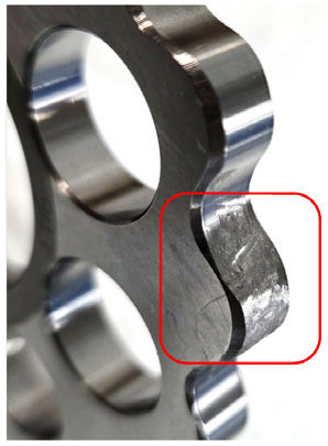 Figure 4—“Damaged” cycloidal disc with a simulated worn-out lobe (highlighted). This was achieved by removing material from the lobe flank and increasing the surface roughness.