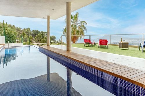 Altea Esmeralda Modern and luxurious holiday house with heated pool in Altea, Costa Blanca, Spain for 8 persons. The house is situated in a coastal, hilly, and residential area, and is located 4 km from Altea Campomanes beach....