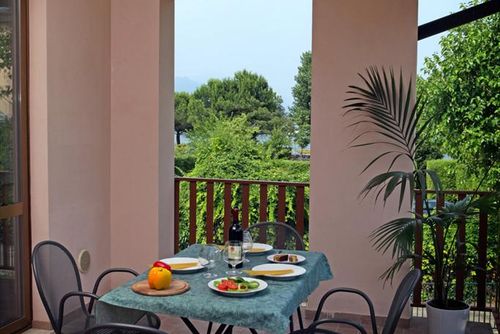 Garden Tourist Apartment  with private pool in Manerba Del Garda -Bs-, Lago di Garda, Italy for 7 persons...