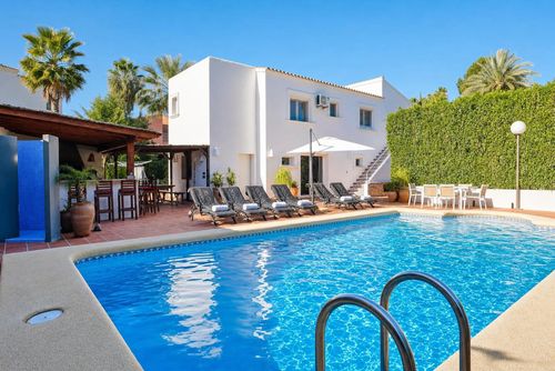Villa Andrago: Moraira, Costa Blanca, España. Terraza y piscina, Jardín y piscina, Hamacas y Mueble para exteriores