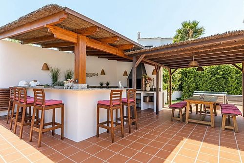 Villa Andrago: Moraira, Costa Blanca, Spanien. Utomhus matplats och Täckt terrass