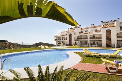 Las Palmeras 300 Schöne und komfortable Wohnung in Mijas Costa, Andalusien, Spanien mit Gemeinschaftspool für 4 Personen. Die Wohnung befindet sich in einer Wohn- und Berglandschaft....