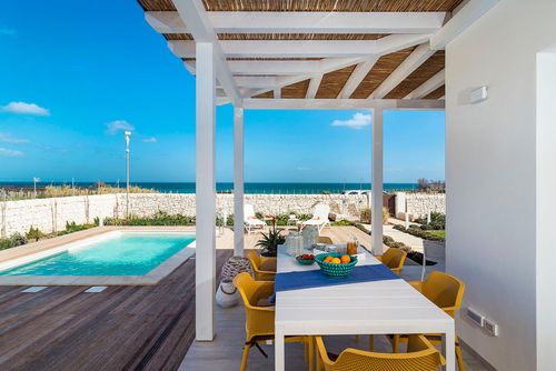 Villa San Lorenzo Timo Villa with private pool in Marzamemi, Sicily, Italy, for 6 persons. The house is situated in a residential beach area, 500 m from San Lorenzo beach, 300 m from the beach, 3 km from Marzamemi, and 100 m from the rocky beach....