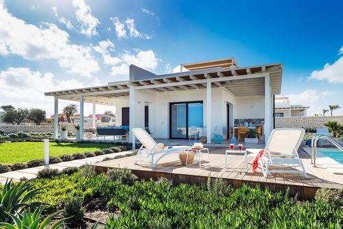 Villa San Lorenzo Timo Villa with private pool in Marzamemi, Sicily, Italy, for 6 persons. The house is situated in a residential beach area, 500 m from San Lorenzo beach, 300 m from the beach, 3 km from Marzamemi, and 100 m from the rocky beach....