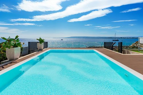 Villa Angelina Luxury villa in Plemmirio, Sicily, Italy with private pool for 8 persons. The villa is situated in a residential beach area and is 25 m from direct access to the sea and rocks below the beach....
