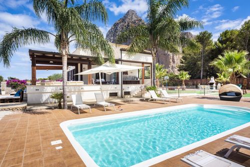 Villa Aronica 14p Villa in San Vito Lo Capo, Sicily, Italy with private pool for 14 people. The house is situated in a residential beach area, close to restaurants and bars, shops, supermarkets, and a tennis court, 200 m from San Vito Lo Capo beach and 0....