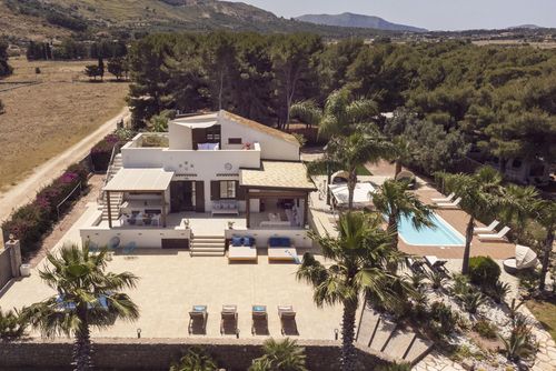 Villa Aronica 14p Villa in San Vito Lo Capo, Sicily, Italy with private pool for 14 people. The house is situated in a residential beach area, close to restaurants and bars, shops, supermarkets, and a tennis court, 200 m from San Vito Lo Capo beach and 0....
