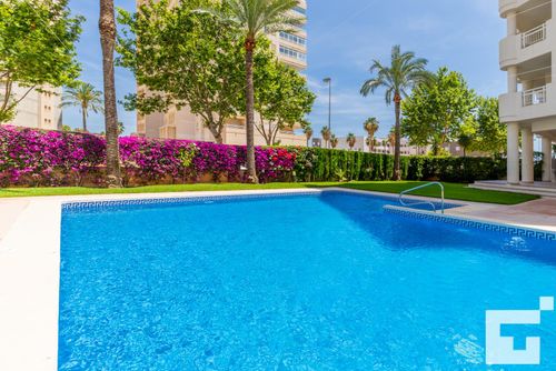 Apolo XII 4C - Grupo Turis Apartamento en Calpe, Costa Blanca, España, con piscina comunitaria para 5 personas. El apartamento se encuentra cerca de restaurantes y bares, tiendas y supermercados, y está a 50 m de la playa....