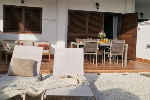 Apartment Casa de Femmie: San Juan de los Terreros, Andalusia, Spain. Garden, Outdoor dining area and Communal swimming pool