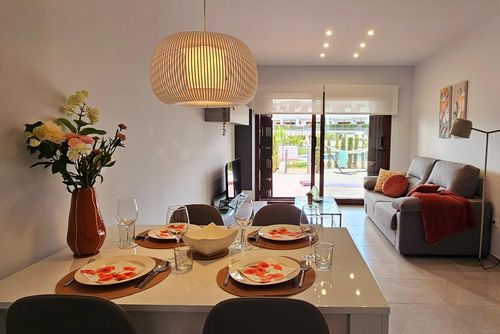 Casa de Las Flores Modern and cheerful apartment in San Juan de los Terreros, Andalusia, Spain with a communal pool for 5 persons. The apartment is situated in a beach resort, in a residential and mountainous beach area, close to supermarkets and 500 m from the beach....