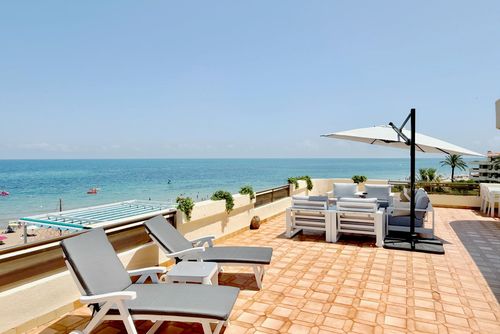 Playa Grande 52 by homeprive Beautiful and comfortable apartment with communal pool in Denia, Costa Blanca, Spain for 6 persons. The apartment is situated in a residential beach area, close to restaurants and bars, shops and supermarkets, and 25 m from the beach....