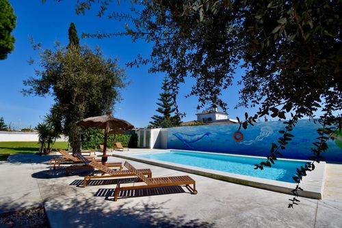 Hacienda Azul Large and comfortable villa in Chiclana de la Frontera, Costa de la Luz, Spain with private pool for 15 persons. The house is situated in a rural and residential beach area and is 2 km from La Barrosa beach....