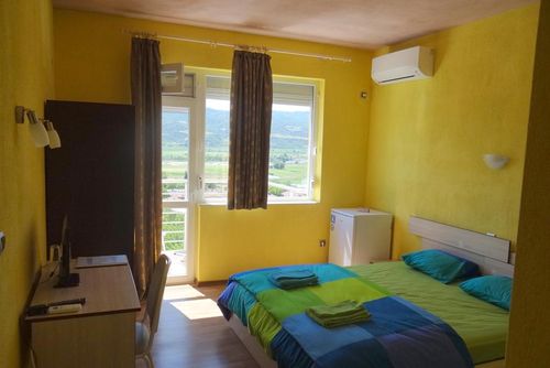 Struma Dolinata queen size bed Hotel room in Strumyani, Southwestern Bulgaria (region Sandanski), Bulgaria for 2 persons...