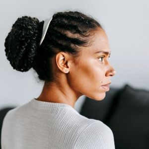 Black female low bun style hair style preview