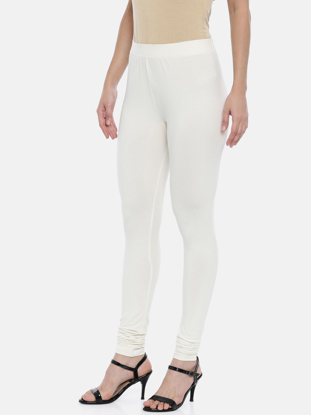 Huggy Women Cream Solid Ankle-Length Leggings (M) - Yavonne