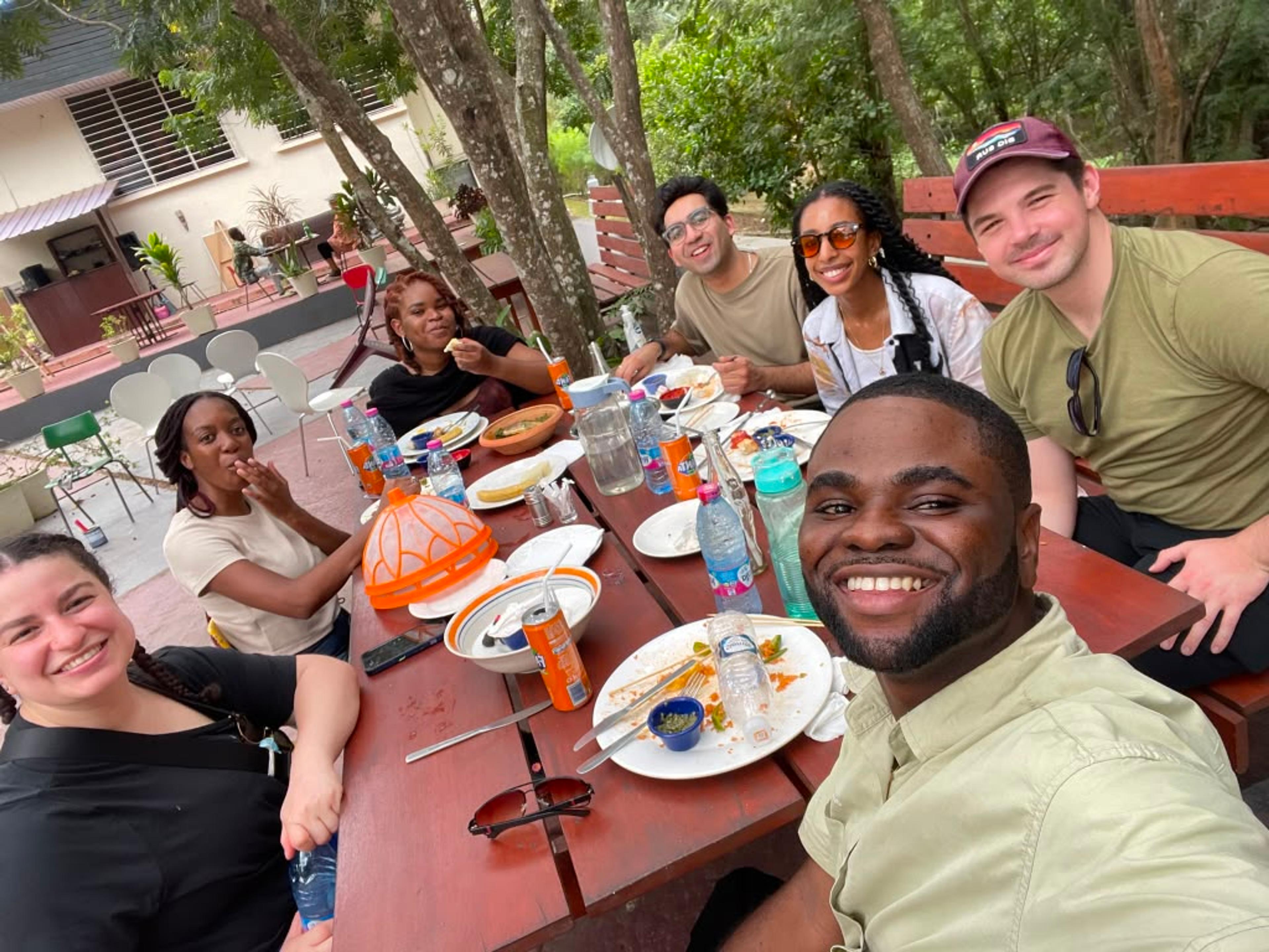 An early-career professional connecting with peers at an Akomapa gathering