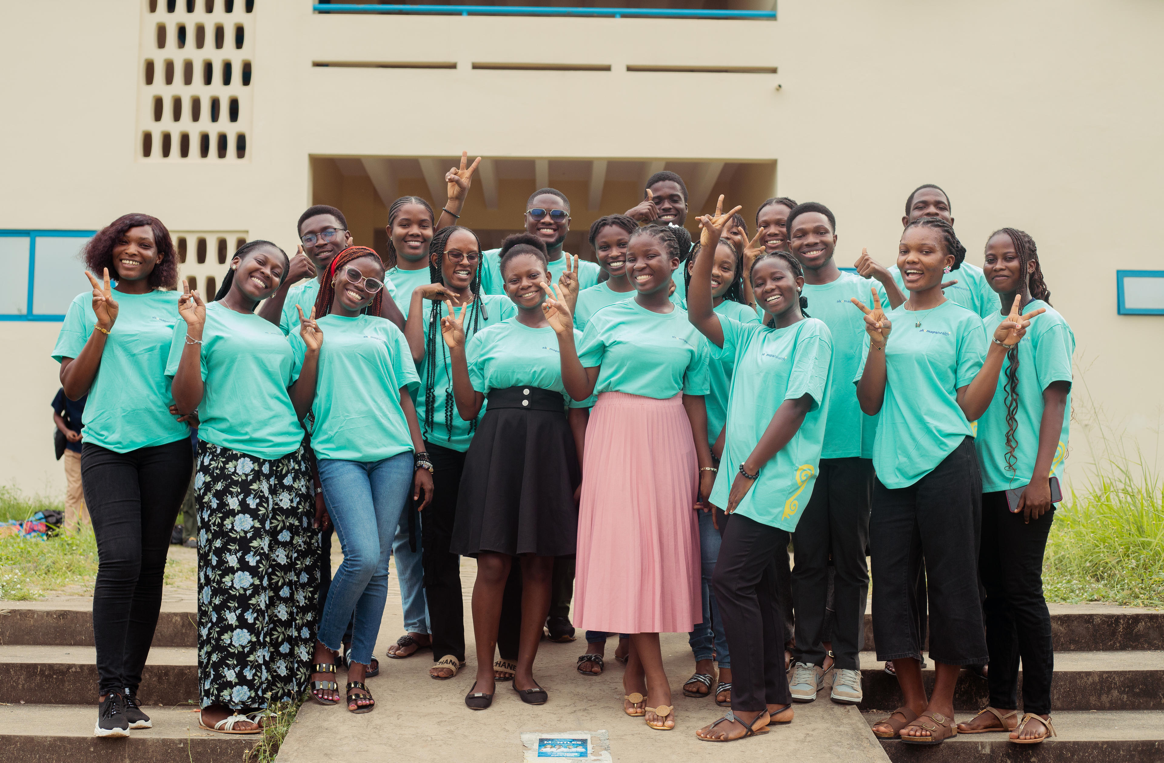 Akomapa students, faculty, and community members learning together