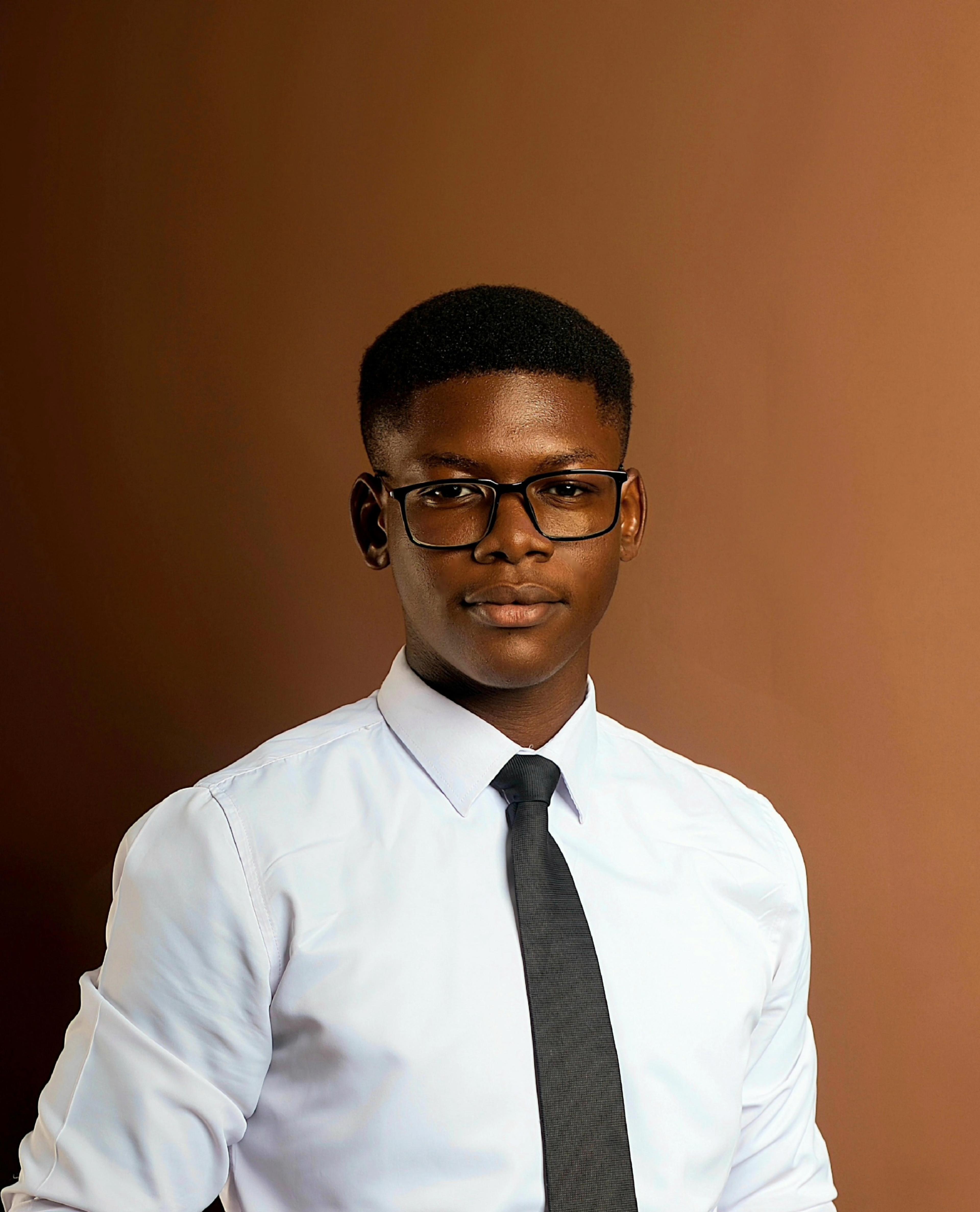 Portrait of Austin Afutu, Training & Standards Coordinator at Akomapa–UG Community Health Hub