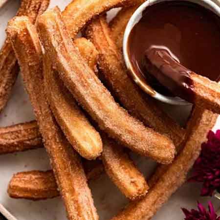 Hector's Mexican Grill quesabirria tacos with consommé