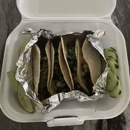 Tacos La Mixteca food truck and patio seating