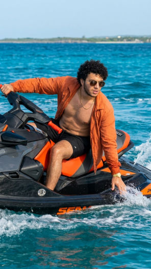 Confident Rider on an Orange Jet Ski Free Prompt — Portrait AI art prompt example for Gemini and Stable Diffusion