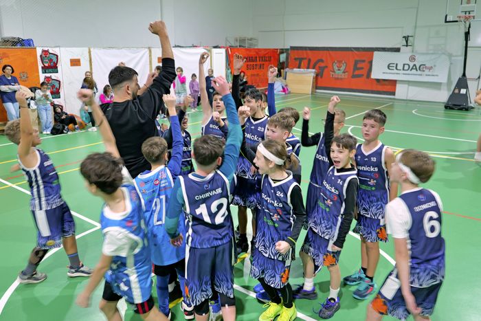 League athletes competing in team uniforms