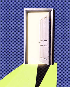 An open door with light spilling through it.